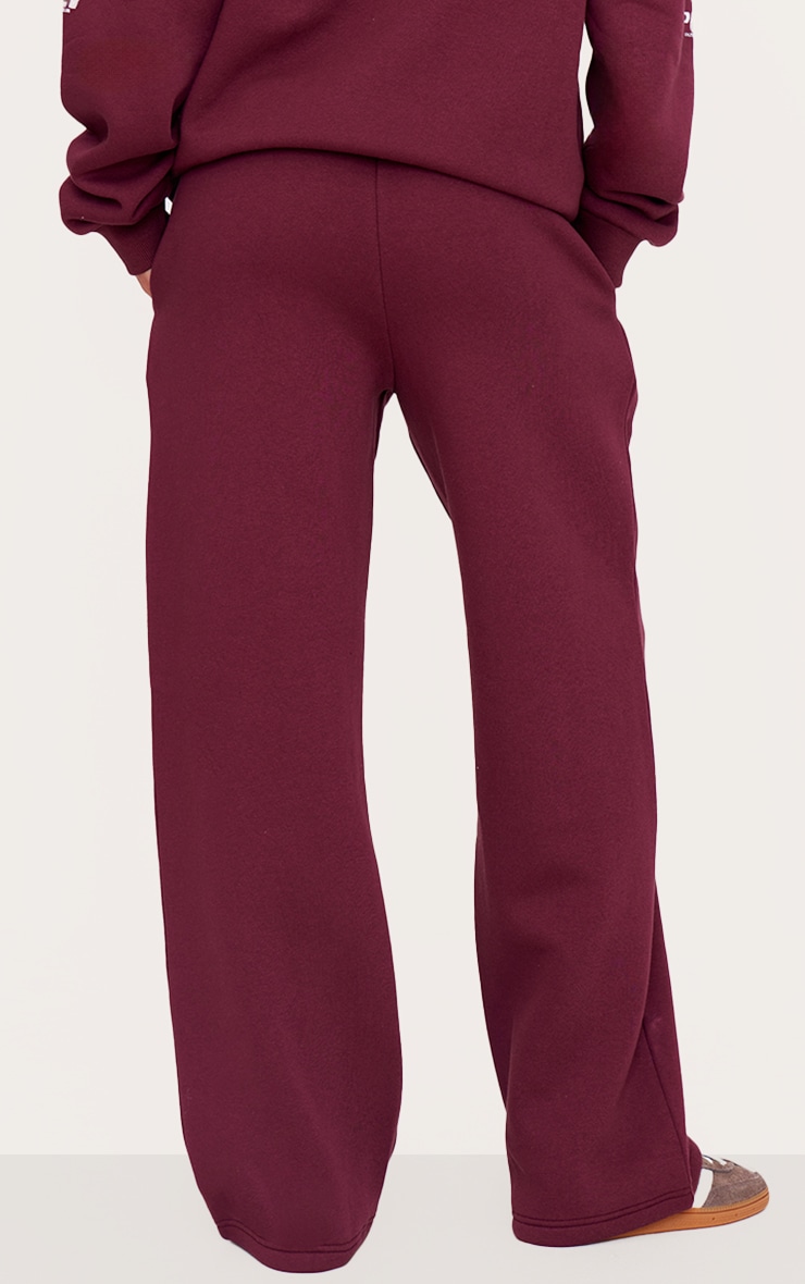 PRETTYLITTLETHING Tall Burgundy Logo Printed Wide Leg Joggers 3 PRETTYLITTLETHING Tall Burgundy Logo Printed Wide Leg Joggers