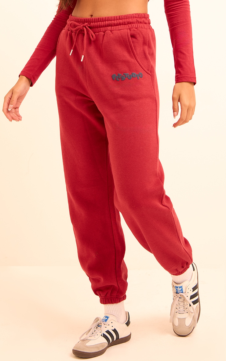 Cherry Red PLT Studio Archive Puff Print Drawstring Cuffed Joggers 2 Cherry Red PLT Studio Archive Puff Print Drawstring Cuffed Joggers