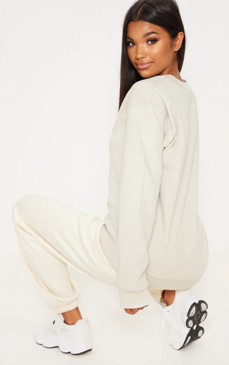 PRETTYLITTLETHING Sand Graphic Oversized Fit Sweater 5 PRETTYLITTLETHING Sand Graphic Oversized Fit Sweater