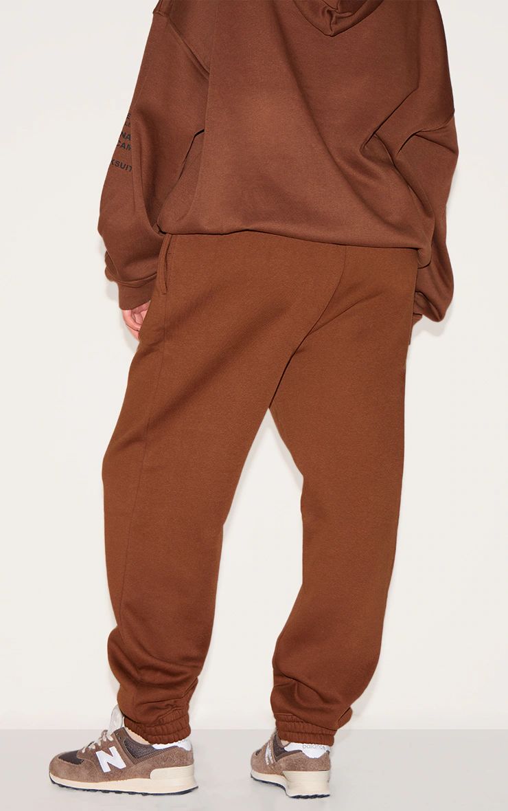 PRETTYLITTLETHING Plus Chocolate Slogan Print Joggers 6 PRETTYLITTLETHING Plus Chocolate Slogan Print Joggers